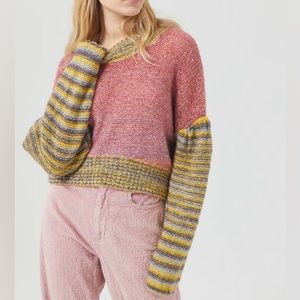 Bright pink, purple and yellow knitted sweater. Super cute puff striped sleeves!